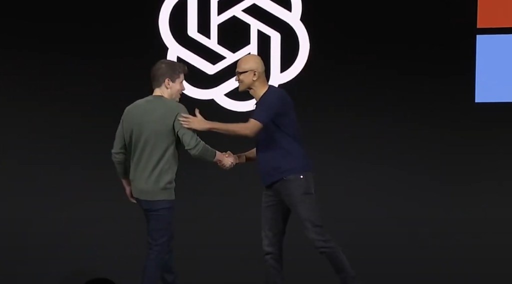 OpenAI explore les revendications antitrust contre Microsoft : dernier rapport 6 openai ceo sam altman shaking hands with microsoft ceo satya nadella