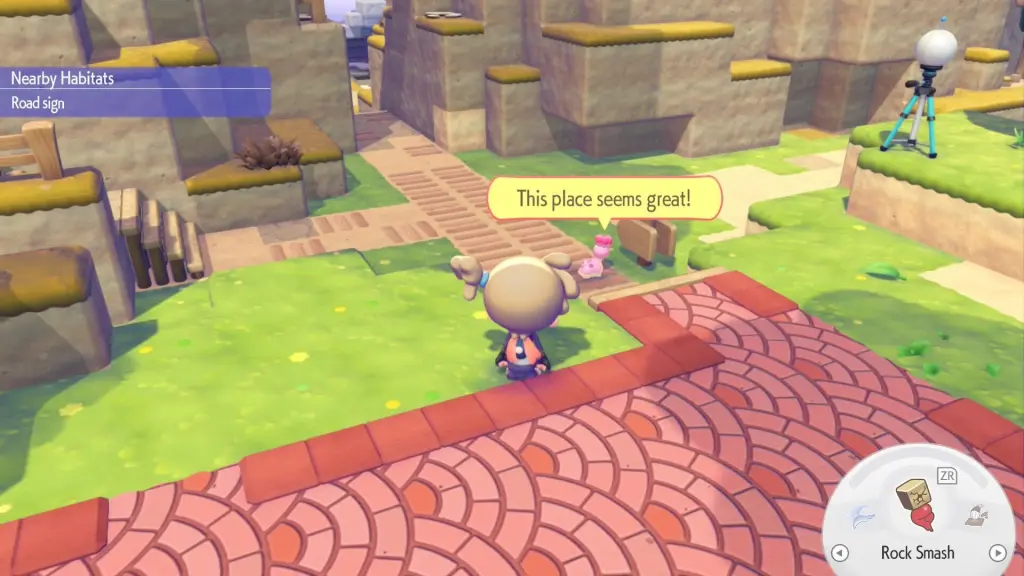 Comment obtenir Shellos à Pokopia : Lieux et astuces 6 Un Shellos rose regarde un panneau et dit "Cet endroit semble génial !"